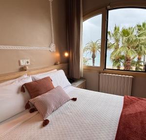 Postel nebo postele na pokoji v ubytování Hotel Celimar