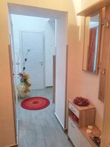 a hallway with a door leading to a room at 2 bedrooms apartement with sea view furnished terrace and wifi at Pianoconte 2 km away from the beach in Piano Conte