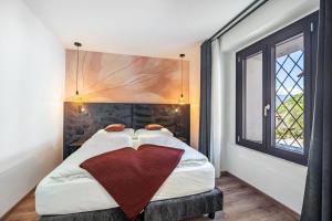 Ένα ή περισσότερα κρεβάτια σε δωμάτιο στο Thanhammer Apt Porphyr +11 φωτογραφίες