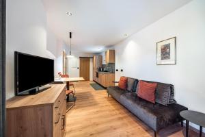 Μια τηλεόραση ή/και κέντρο ψυχαγωγίας στο Thanhammer Apt Porphyr