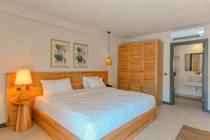 Postel nebo postele na pokoji v ubytování Unsal Hotel