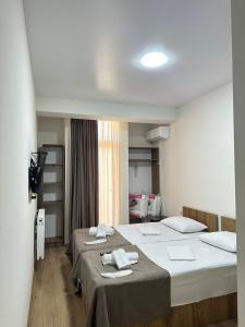 Katil atau katil-katil dalam bilik di Dalida Hotel