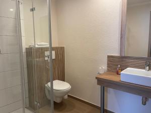 Een badkamer bij Hotel Andrea