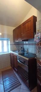 Kuchyň nebo kuchyňský kout v ubytování Romantic Stay in Tivoli