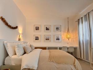 En eller flere senge i et værelse på La Casa Al Mare