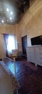 TV a/nebo společenská místnost v ubytování Romantic Stay in Tivoli