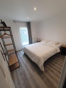 Postel nebo postele na pokoji v ubytování Massy Appart Hotel + 41 fotografií