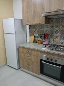 Een keuken of kitchenette bij Appartement Ben Arous