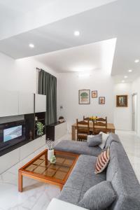 Χώρος καθιστικού στο Rosa Rooms