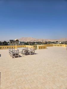 a row of benches on the roof of a building at Egypt Villa Garden in Luxor