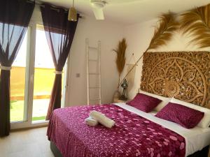 Posteľ alebo postele v izbe v ubytovaní Apartamento Atico Duplex de 1 dorm en Tarifa