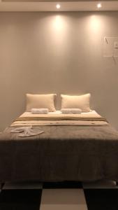 Postel nebo postele na pokoji v ubytování Hotel Pousada Santiago