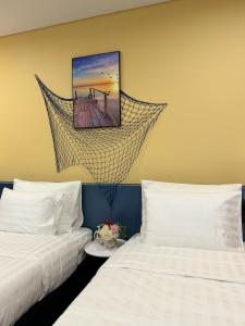 Voodi või voodid majutusasutuse Flamingo Hải Tiến - Căn hộ khách sạn View biển toas