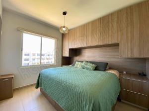 Postel nebo postele na pokoji v ubytování Nuevo y Muy Bonito Departamento Almarena 4