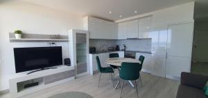 Η κουζίνα ή μικρή κουζίνα στο ACR Holiday Apartment