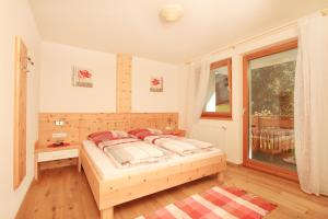 Posteľ alebo postele v izbe v ubytovaní Appartements Sonnenschein