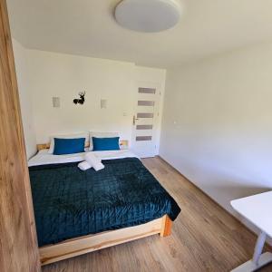 Postel nebo postele na pokoji v ubytování Apartament Panorama 5 7