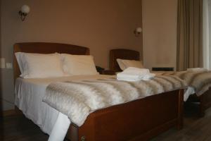Postel nebo postele na pokoji v ubytování Hotel Chique Aliados