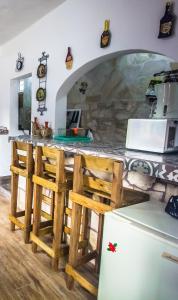 Kuchyň nebo kuchyňský kout v ubytování Tiny house Comulco con aire acondicionado.