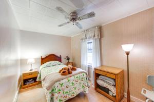 a bedroom with a bed with two teddy bears on it at Charming West Mifflin House - 3 Mi to Kennywood! in West Mifflin