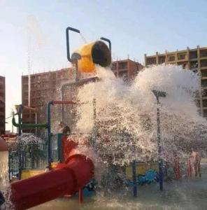 a playground with water spraying out of a fire hydrant at بورتو جولف مارينا الساحل الشمالي 107 in Alexandria