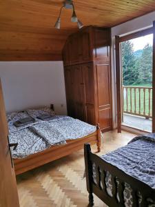Postel nebo postele na pokoji v ubytování Pine corner Mojkovac