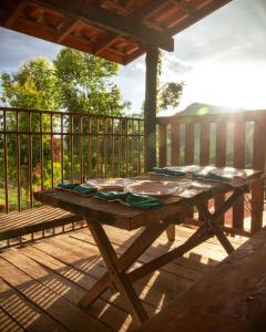 Balkón nebo terasa v ubytování Chale brilho das estrelas em São Thomé das Letras-MG