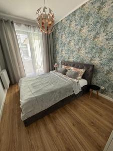 Posteľ alebo postele v izbe v ubytovaní GARBARY Old Town LUX Apartment 106, self check-in 24h, free parking