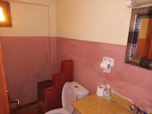 a bathroom with a toilet and a sink at Dar Zara in Ouarzazate