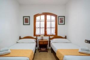 Postel nebo postele na pokoji v ubytování Dúplex con encanto