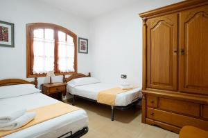 Postel nebo postele na pokoji v ubytování Dúplex con encanto