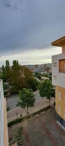 a view of a parking lot from a building at Seaside Apartment Plazhi vjeter in Vlorë