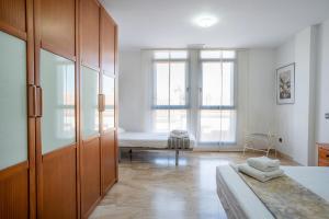 Posteľ alebo postele v izbe v ubytovaní Apartamento Pepi