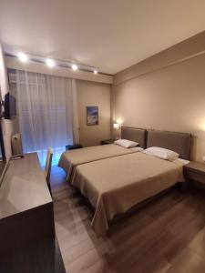 Postel nebo postele na pokoji v ubytování Plaza Hotel