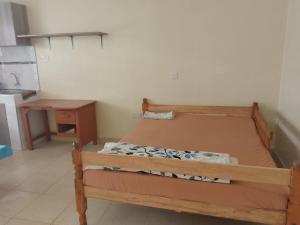 מיטה או מיטות בחדר ב-juja modern apartment