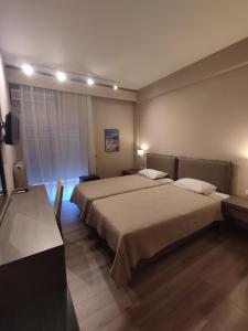 Postel nebo postele na pokoji v ubytování Plaza Hotel