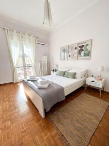 Una cama o camas en una habitación de Apartment at center of Corfu town-Urban Hideout