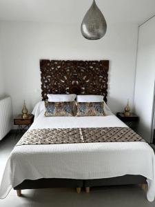 Ένα ή περισσότερα κρεβάτια σε δωμάτιο στο Appart La Mantilla, wifi, clim, parking, Netflix