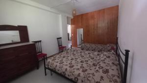 A bed or beds in a room at Villa Magnolia