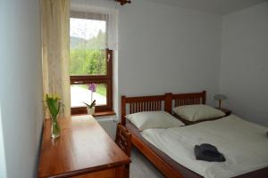 Posteľ alebo postele v izbe v ubytovaní Pension Relax