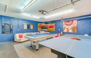 a room with a ping pong table in it at Spacious Citrus Hills Home with Pool and Game Room! in Hernando