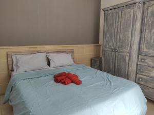 Кровать или кровати в номере Ta' Marija Home