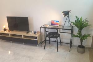 TV a/nebo společenská místnost v ubytování CasaMia RD B&B