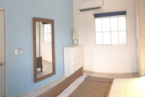 Postel nebo postele na pokoji v ubytování CasaMia RD B&B