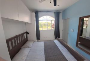 Postel nebo postele na pokoji v ubytování CasaMia RD B&B