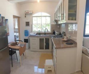 Kuchyň nebo kuchyňský kout v ubytování CasaMia RD B&B