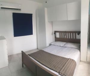 Postel nebo postele na pokoji v ubytování CasaMia RD B&B