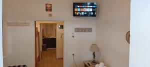 a room with a hallway with a room with a lamp at Sunrise Apartments in Livadia