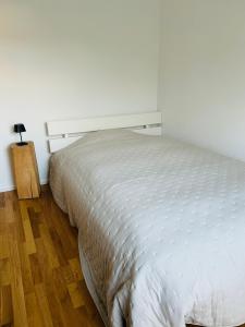 Ein Bett oder Betten in einem Zimmer der Unterkunft Deluxe