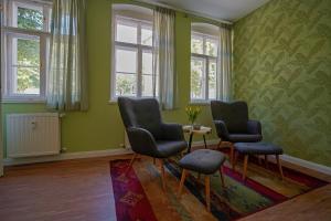 Posezení v ubytování Ferienwohnung Am Stadtpark + 33 fotografií